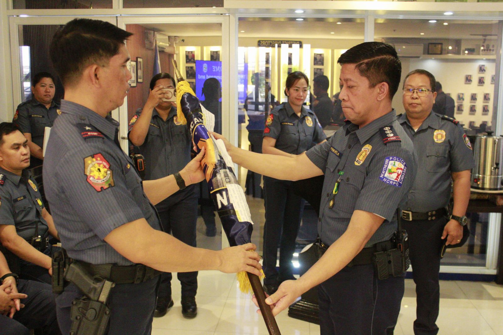 May be an image of 4 people and text that says '8 3m bns NUELA N NCRPO'