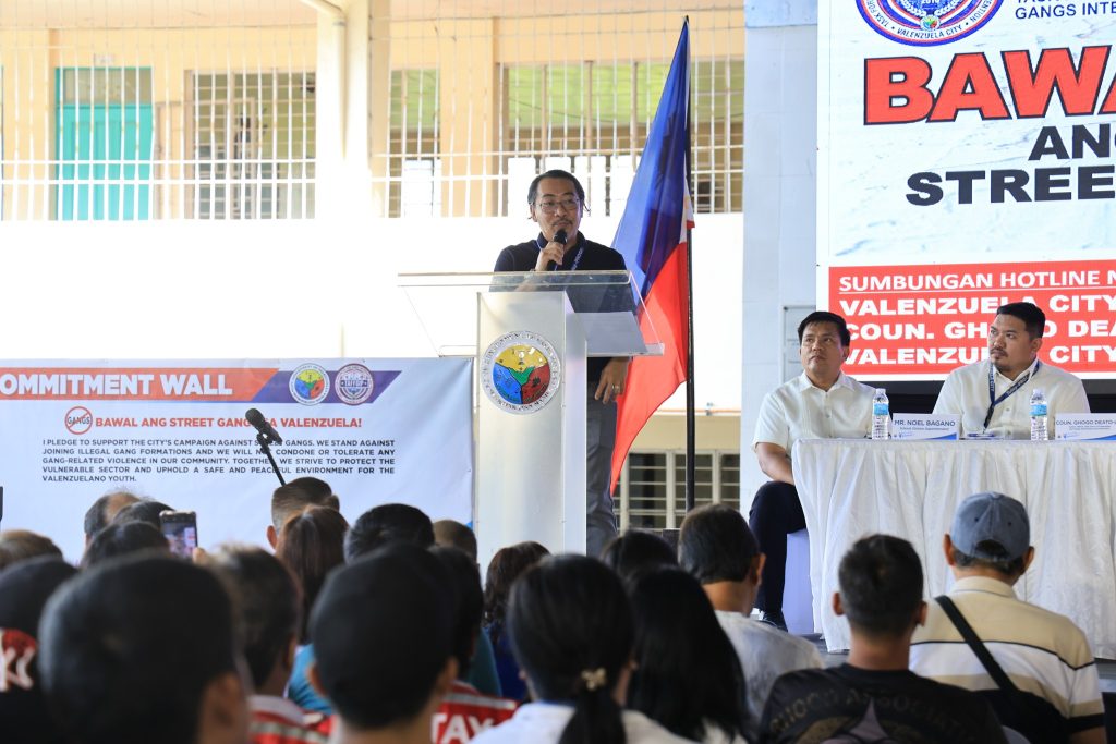 May be an image of 9 people and text that says 'GANGS INT BAW AN STREE OMMITMENT WALL រះាជន BAWAL ANG STREET GANG PLEDGE IONS GANG-REL LATERMICL VIOLENCE CEIN รอ NOSP IDCONNI COMMUNITY มมเขา WL CETHE UPHOLD SAFE SAFE PEA VALENZUELA! VALENZUELA YOUTH. でにに,用りさ GANGS AGAINST ONDONE NE5TBIVETO TOLERATE ANY ME ENVIRONMENT THE SUMBUNGAN HOTLINE VALENZUE CIT COUN. GH DE ALENZU CIT RNCM'