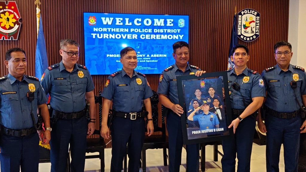 May be an image of 6 people and text that says 'ATORAL WELCOME NORTHERN POLICE DISTRICT TURNOVER CEREMONY PMGEI Gu POLICE PI นวเม แวม CRP ONY DNYA ABERIN Speaker ABAO ABERIN PBGENJOSEFNODLIGAN PBGEN JOSEFINO LIGAN'