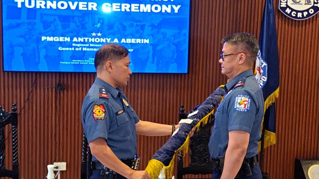 May be an image of 2 people and text that says 'TURNOVER SEREMONY PMGEN ANTHONYA A ABERIN Regienal Direeto Guest of Honor ထအ်် NCRPO CRP まい た器 IPO POLICE NCRPO'