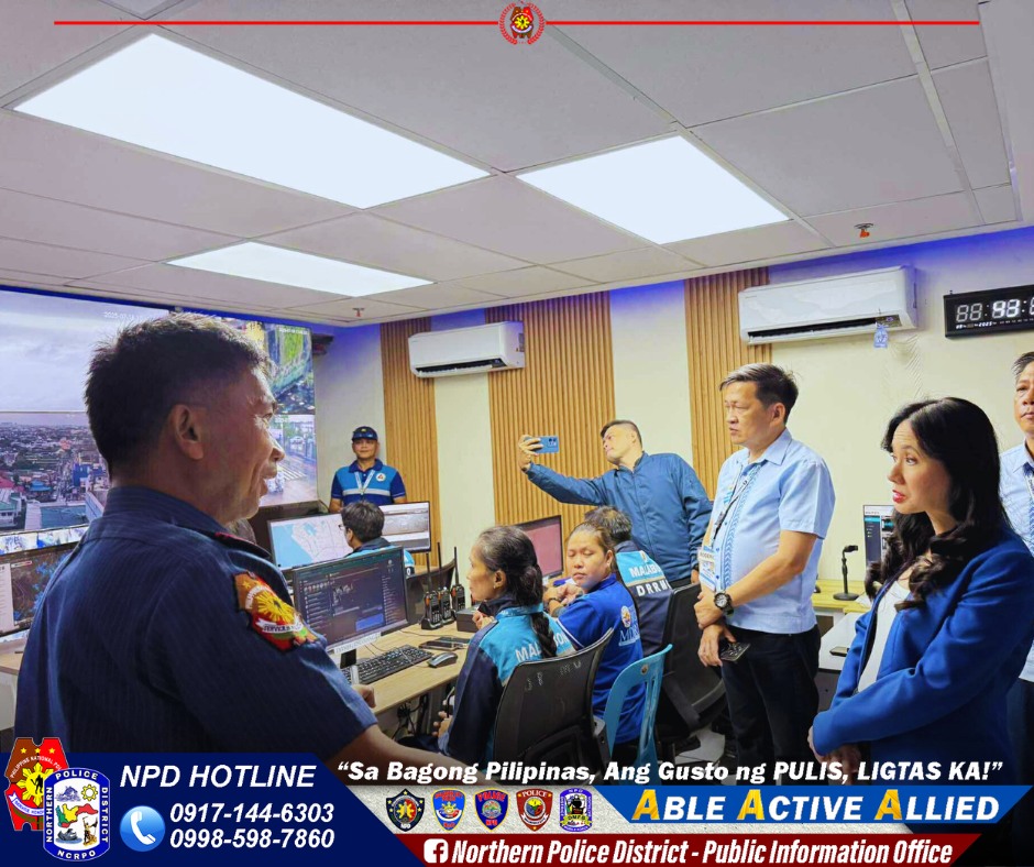 May be an image of 6 people, television, ambulance, newsroom and text that says '88: 88 arg- A DRRU POLIGE CKPO NPD HOTLINE "Sa Bagong Pilipinas, Ang Gusto ng PULIS, LIGTAS KA!" 0917-144-6303 ABLE ACTIVE ALLIED 0998-598-7860 fNorthern f Police District Public Information Office'