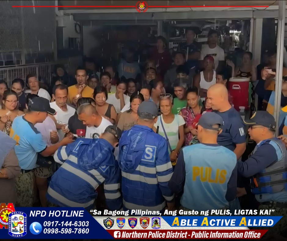 May be an image of 6 people, crowd and text that says 'Bik S PULIS NPD HOTLINE 0917-144-6303 0998-598-7860 "Sa Bagong Pilipinas, Ang Gusto ng PULIS, LIGTAS KA!" ABLE ACTIVE ALLIED f Northern Police District- Public Information Office'