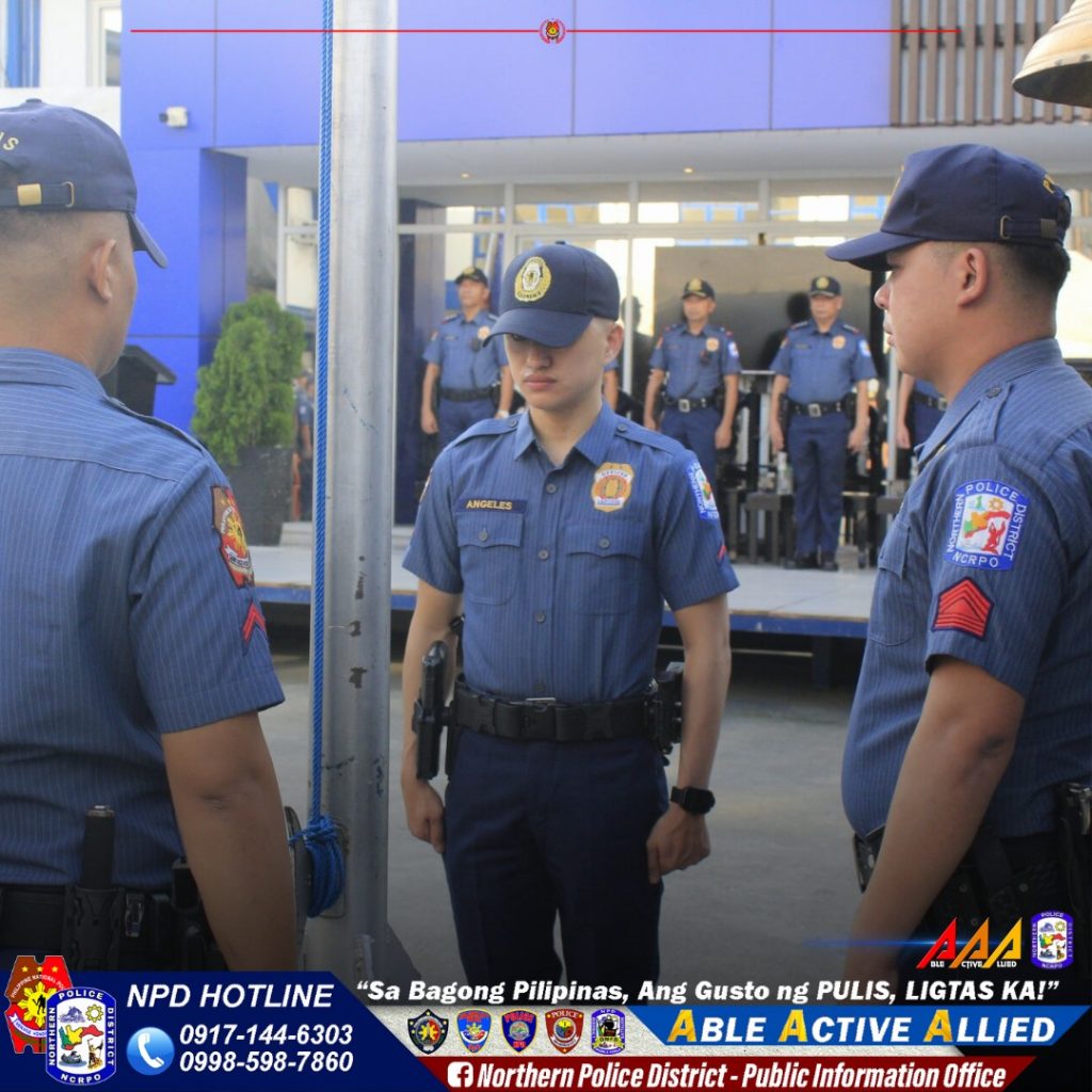 May be an image of 5 people, ambulance and text that says '5 ANGELES POLICE #CRPO TOLIO AAAG NPD HOTLINE "Sa Bagong Pilipinas, Ang Gusto ng PULIS, LIGTAS KA!" 0917-144-6303 ABLE ACTIVE ALLIED 0998-598-7860 f fNorthern Police District- Public Information Office'